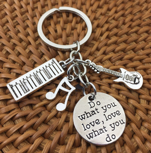 Music Keychain with Piano, Guitar, Saxophone Design
