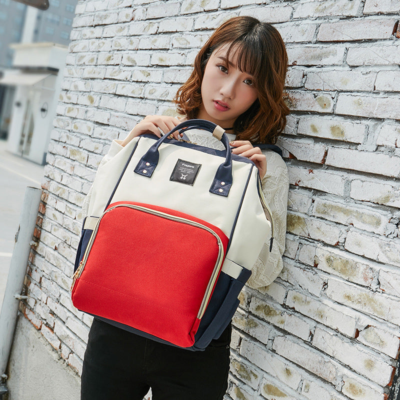 Women's Handbag, Diaper Bag, Tote and Backpack